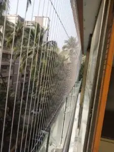 Transparent stainless steel invisible grill installed on high-rise balconies